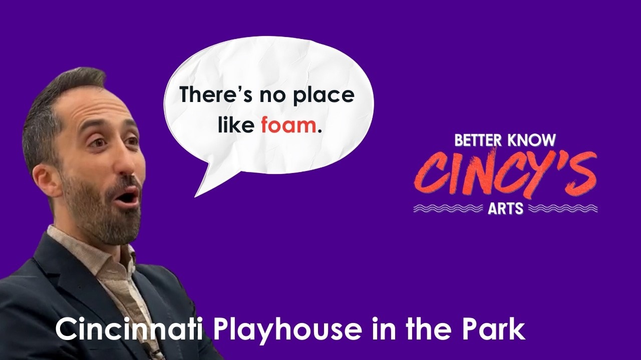 A man speaking with a speech bubble that says "There's no place like foam" at Cincinnati Playhouse in the Park, promoting arts and community events.