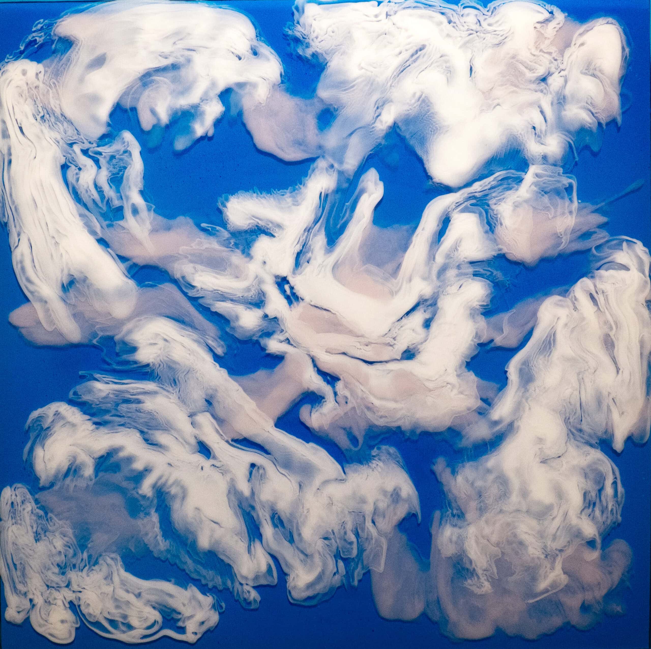 Abstract painting of swirling white clouds against a vibrant blue sky background, emphasizing artistic expression and creativity.